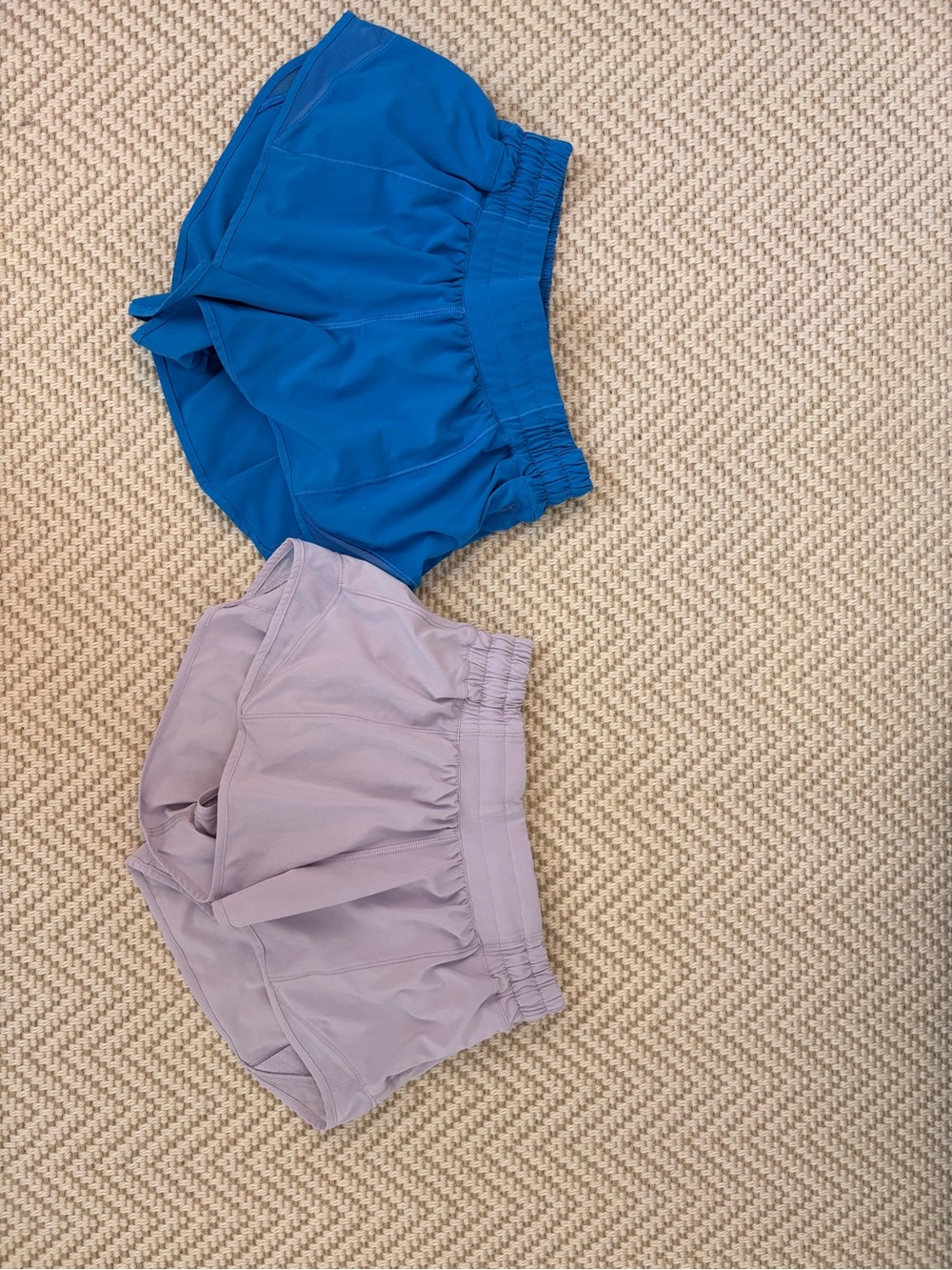 2 pairs of Lululemon 2.5” inseam hotty hots! poolside blue and lavender!